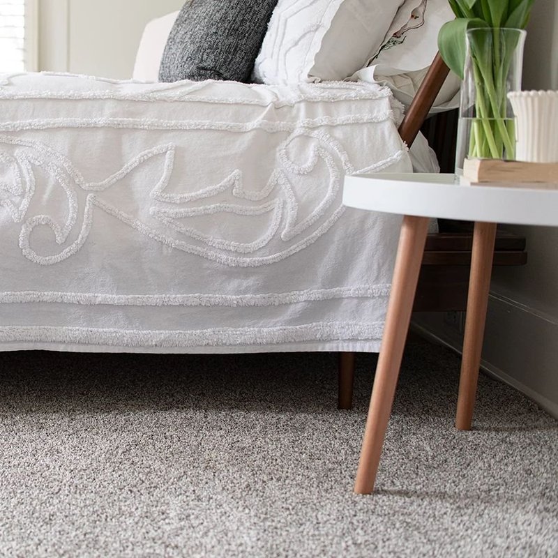 white bed on carpet - Couture Floors in Boerne, TX