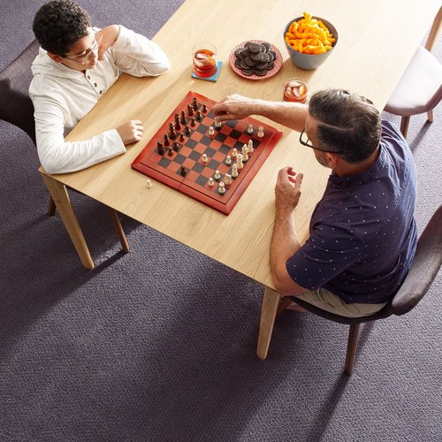 people playing chess - Couture Floors in TX