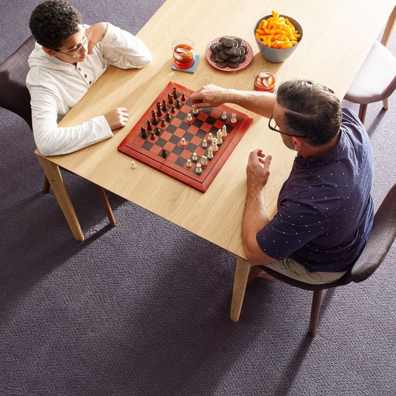 people playing chess - Couture Floors in Boerne, TX