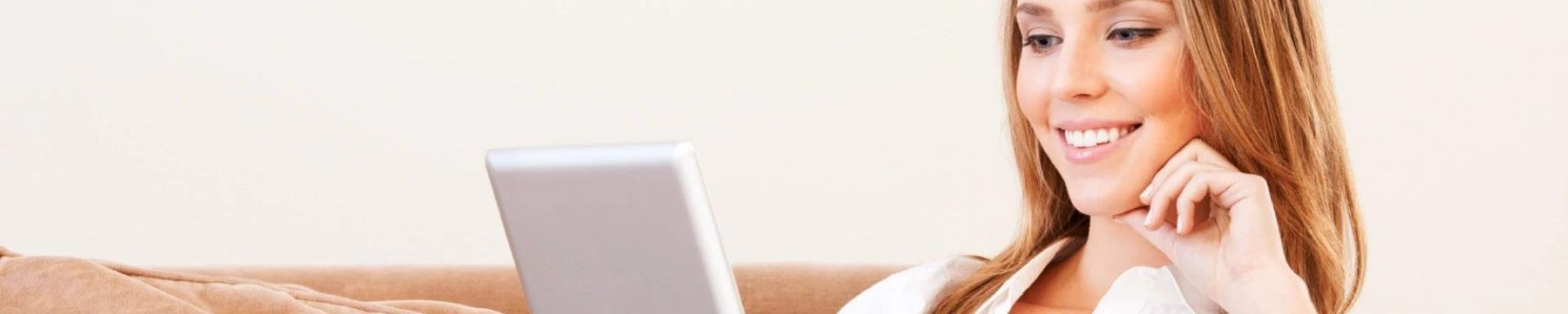 woman on tablet - Couture Floors in Boerne, TX